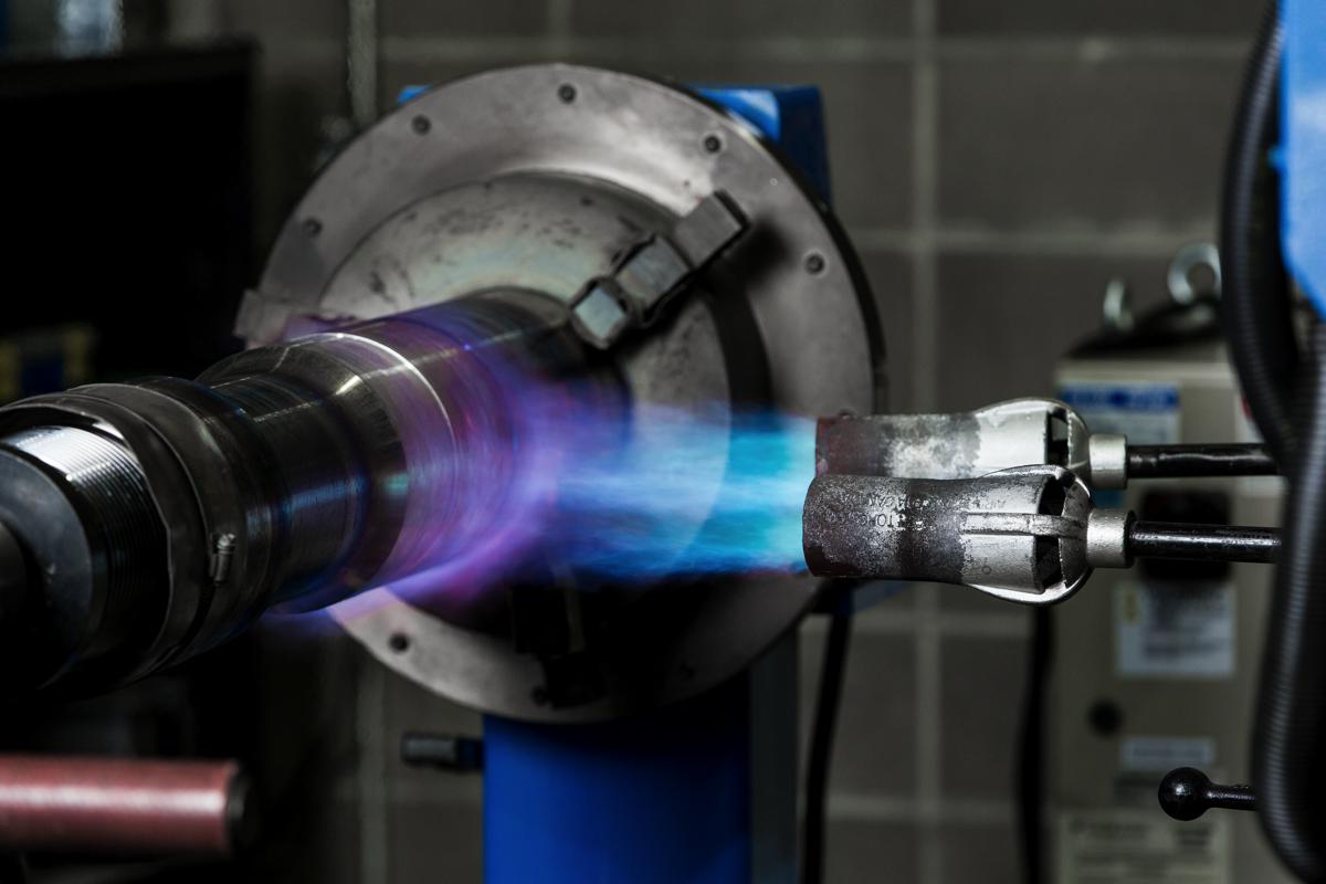 Induction heating of a drilling tool component