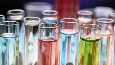 Laboratory vials holding coloured chemical samples