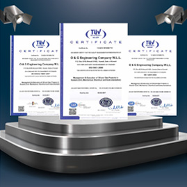 Three TÜV InterCert certificates awarded to O & G Engineering Company W.L.L., displayed on a plinth