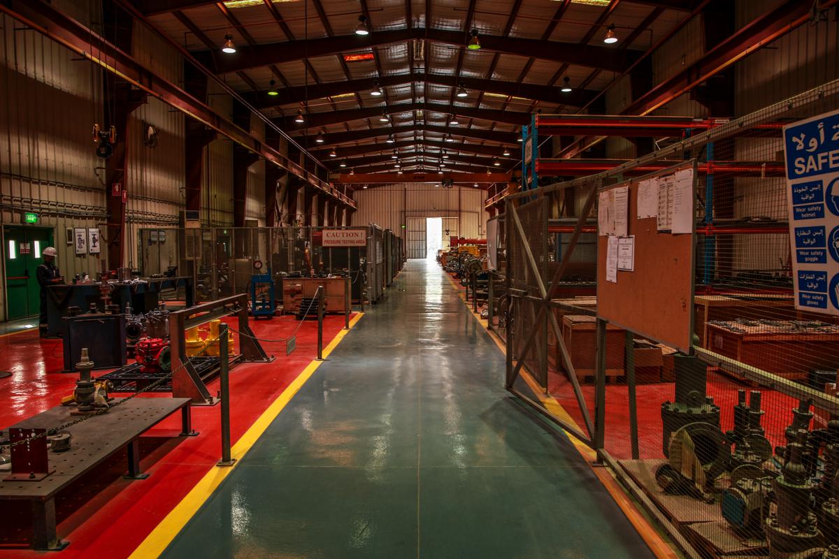 The workshop aisle at the end of the day, the pressure testing enclosure on the left