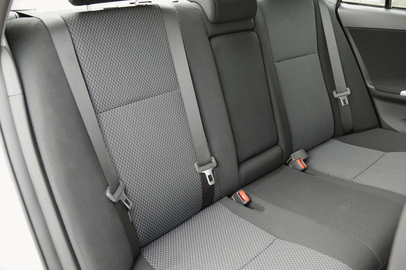 Clean rear passenger seats inside a rental vehicle