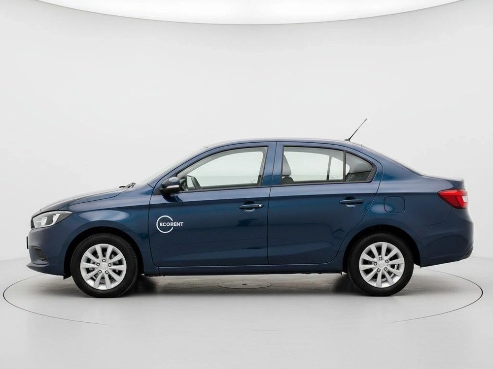 Blue compact sedan, side view